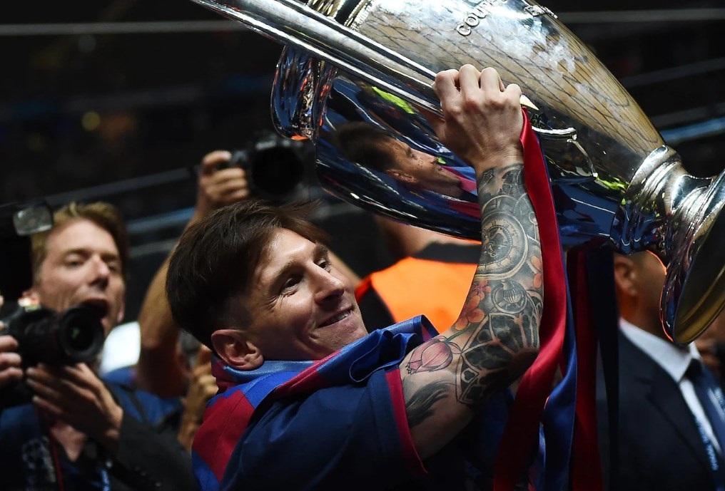 Messi with trophy